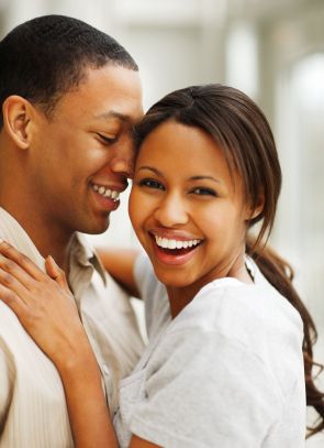 Portrait of a romantic happy young African American couple enjoying